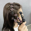 Barrette à Cheveux Latérale à Trois Fleurs